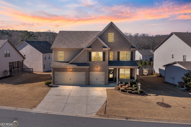 view of front of property featuring a garage