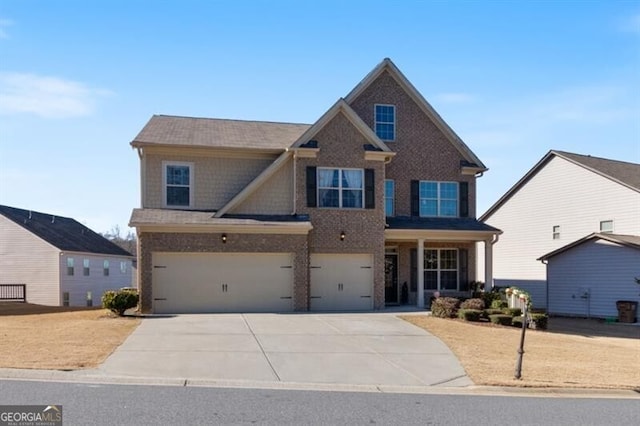 craftsman-style house featuring a garage