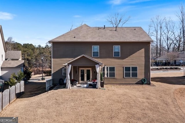 back of house featuring french doors and a patio area