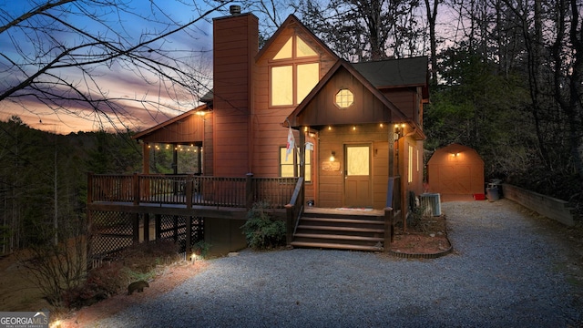 view of front facade featuring a shed