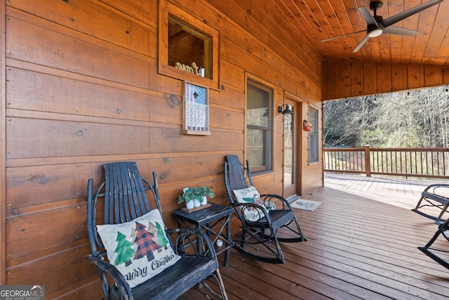 wooden deck with ceiling fan