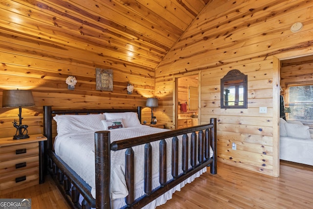 bedroom featuring wooden walls, wooden ceiling, wood-type flooring, and lofted ceiling