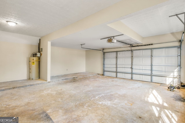 garage featuring gas water heater and a garage door opener