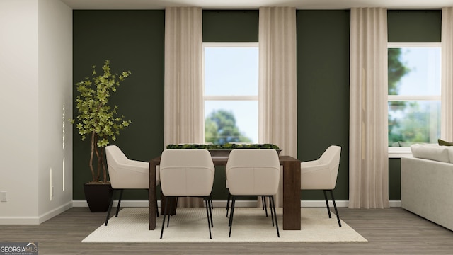 dining area featuring hardwood / wood-style flooring