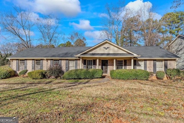 ranch-style house with a front yard