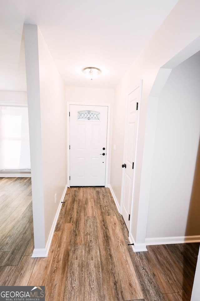 doorway to outside featuring hardwood / wood-style floors