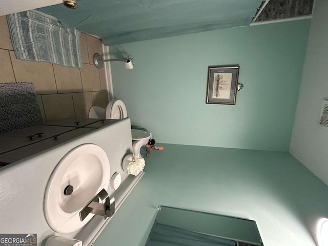 bathroom featuring toilet