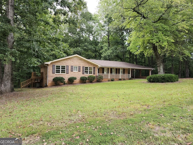 single story home with a front lawn