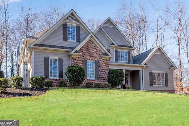 view of front facade with a front lawn