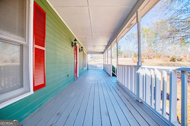 wooden deck with a porch