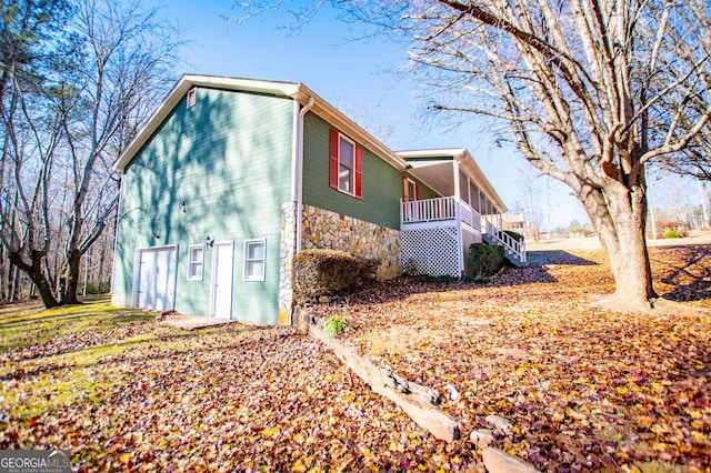 view of property exterior featuring a garage