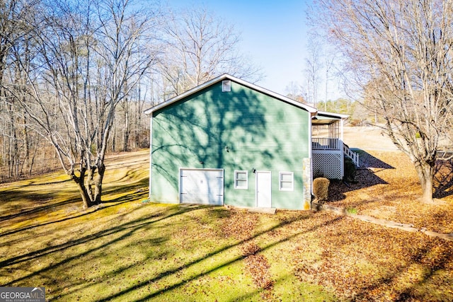 view of outdoor structure with a yard