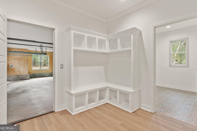 mudroom with recessed lighting, crown molding, baseboards, and wood finished floors