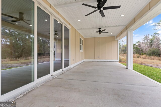 view of patio featuring ceiling fan