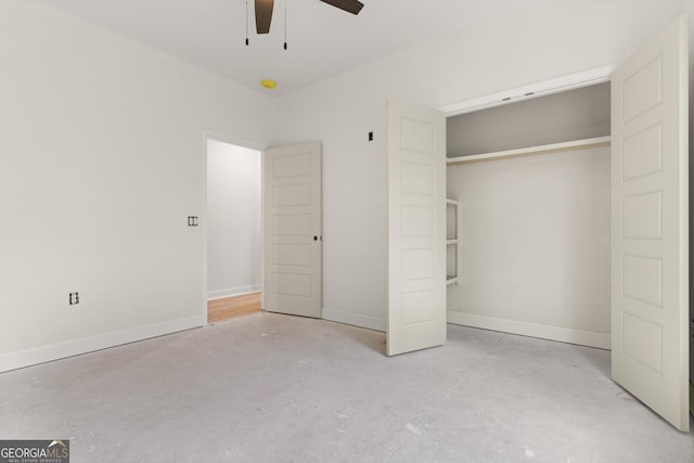 unfurnished bedroom featuring a ceiling fan, unfinished concrete floors, baseboards, and a closet