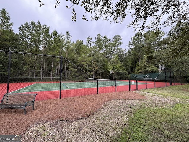 view of sport court featuring community basketball court and fence