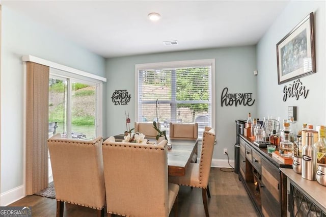 dining room featuring dark hardwood / wood-style floors