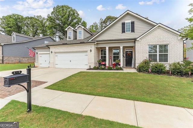 view of front of house with a front lawn, a porch, and a garage