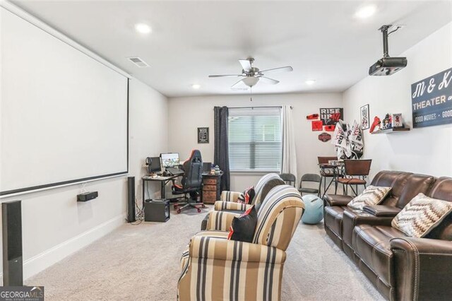 living room featuring ceiling fan and light colored carpet