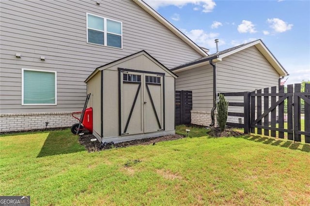 view of outdoor structure with a yard