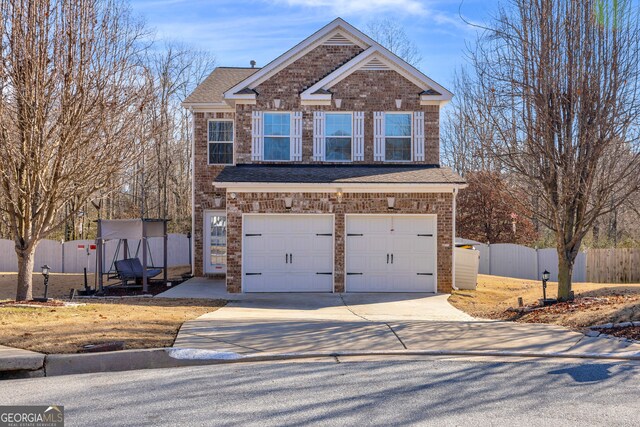 view of front of house with a garage