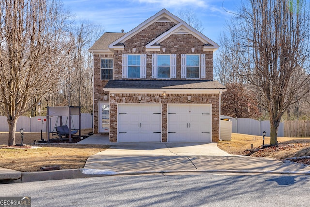 view of front of property featuring a garage