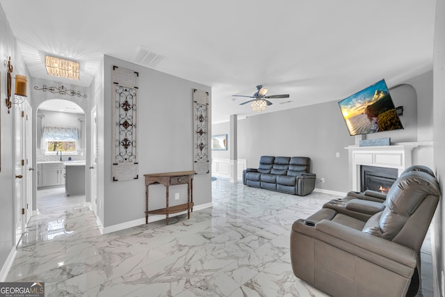 living room featuring ceiling fan