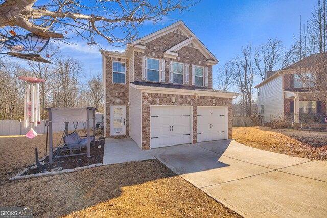 view of front of property with a garage