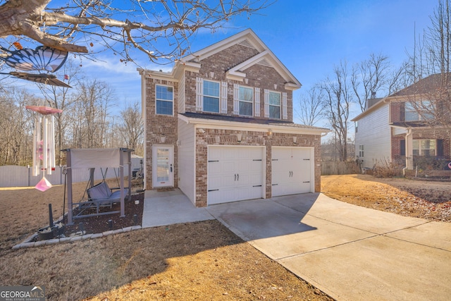 view of front of property featuring a garage