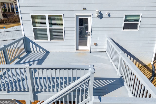 entrance to property featuring a deck