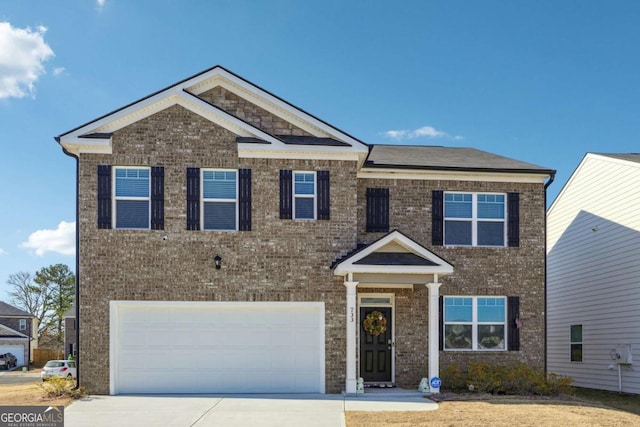 view of front of house with a garage