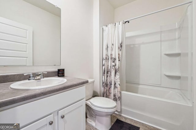 full bathroom featuring tile patterned flooring, vanity, toilet, and shower / tub combo