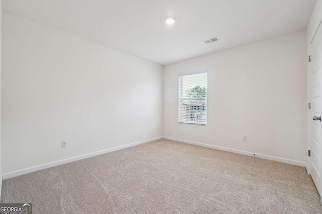 empty room with carpet floors