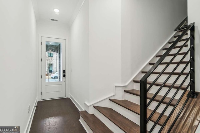 interior space with dark hardwood / wood-style flooring