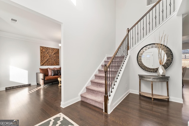 stairs with wood-type flooring