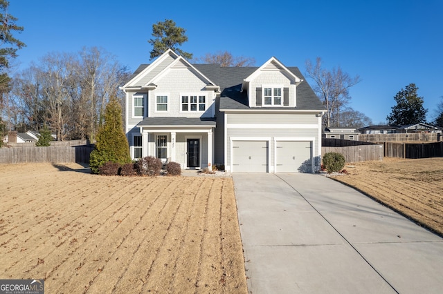 view of front of home with a garage