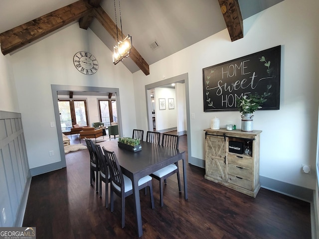 dining area with beamed ceiling, dark hardwood / wood-style flooring, and high vaulted ceiling