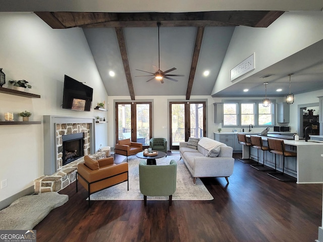 living room featuring french doors, dark hardwood / wood-style floors, and plenty of natural light