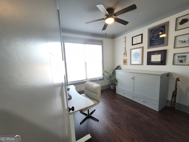 home office featuring ceiling fan and dark hardwood / wood-style flooring