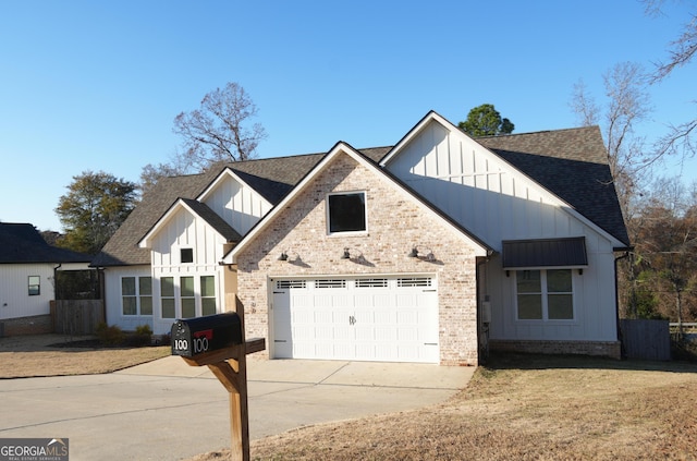 view of front of home with a garage