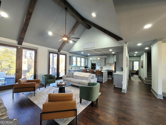 living room featuring beamed ceiling, french doors, dark hardwood / wood-style floors, and ceiling fan