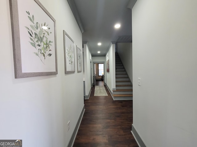 hallway featuring dark hardwood / wood-style floors