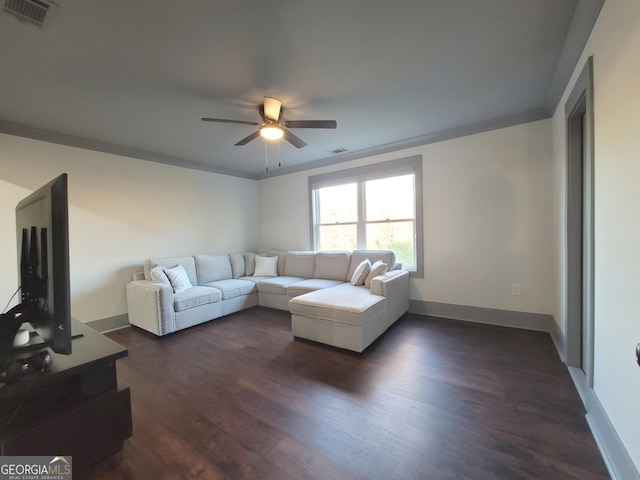 living room with ceiling fan, dark hardwood / wood-style floors, and ornamental molding