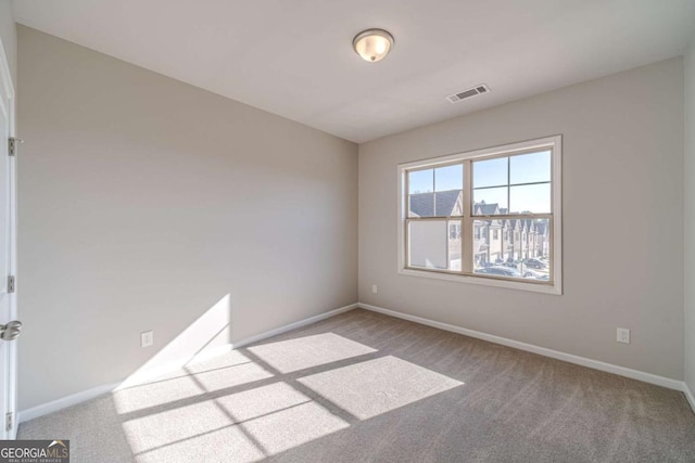 view of carpeted spare room