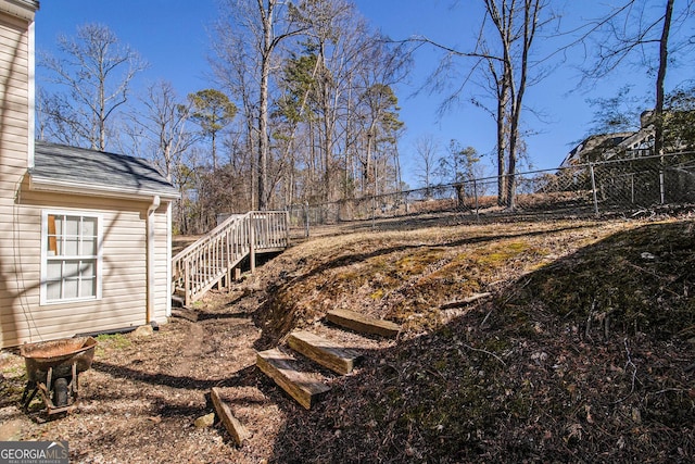 view of yard featuring a wooden deck