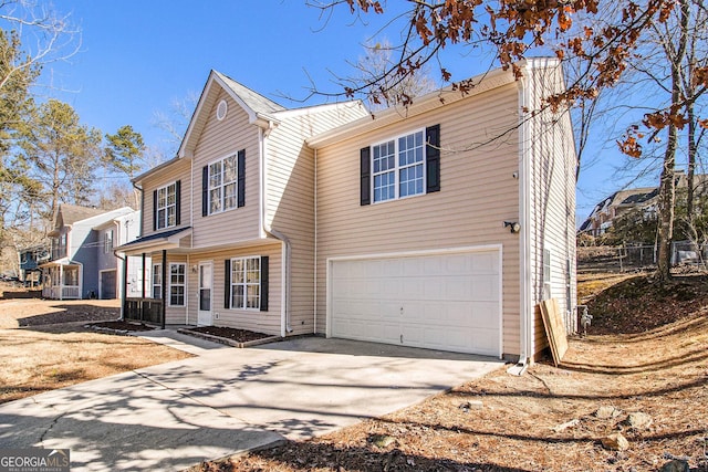 view of front of property with a garage