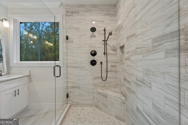 bathroom with vanity and walk in shower