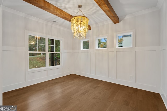 empty room featuring a chandelier, dark hardwood / wood-style flooring, and beamed ceiling