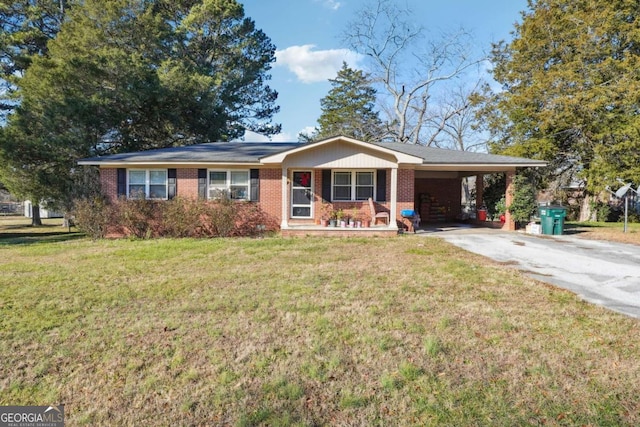 single story home featuring a carport, a porch, and a front lawn