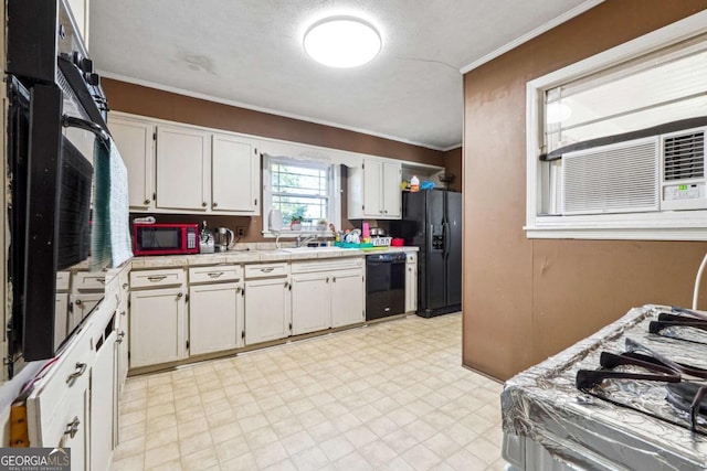 kitchen with black appliances, white cabinets, cooling unit, sink, and ornamental molding